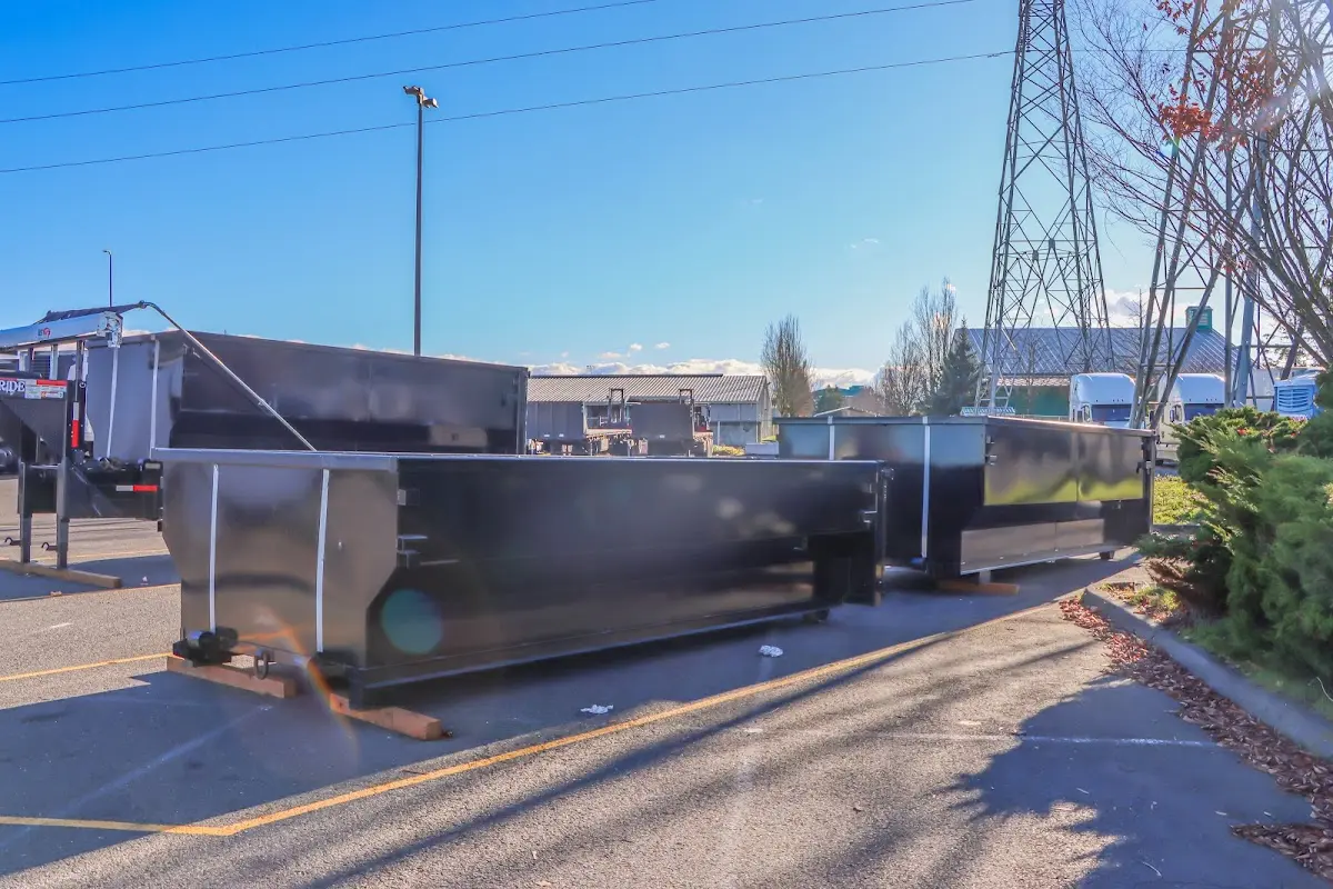 Roll-off dumpster ready for waste disposal at job site for 3 Yard Dumpster Rental in Geneva